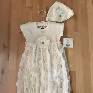 Cream special occasion gown and hat